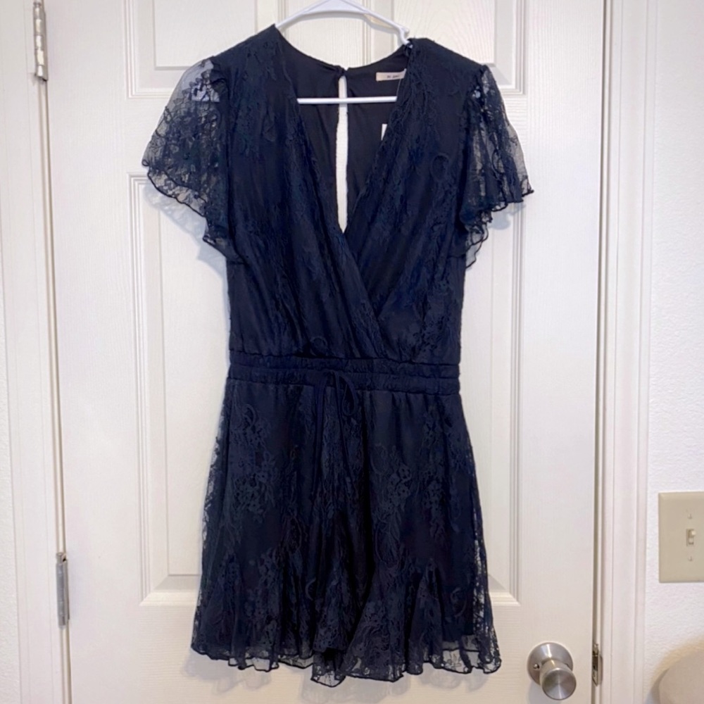 Francesca’s Miami Navy Lace Surplice Romper